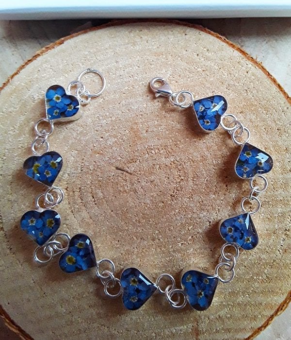 Image of Sterling Sliver Heart shaped bracelet with real flowers